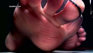 Marvelous feet taunt with sheer toes and puckered feet
