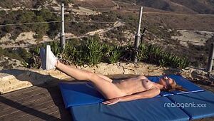 After yoga Russian starlet Merry Pie thumbs her lovely cunny outdoors