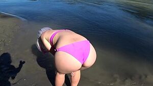 Lesbos rest and nail on the sea bank. Gf with a wooly gash in a bikini doggy-style wiggles a massive butt. Point of view Outdoors.